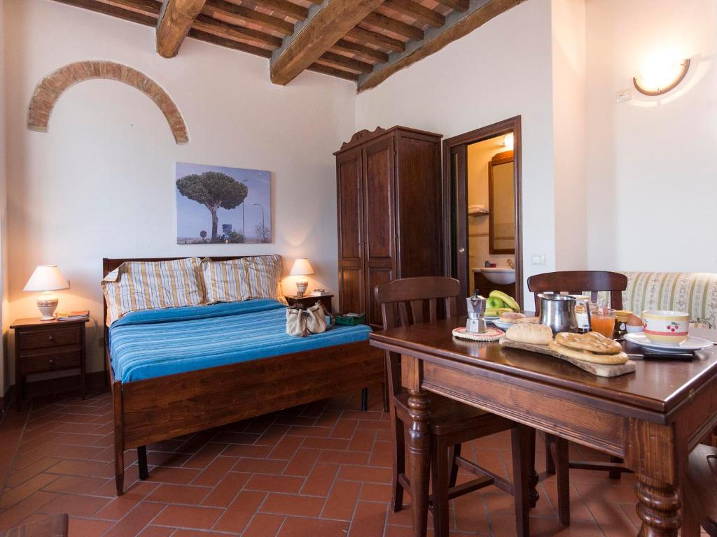 Postel nebo postele na pokoji v ubytování Country House il Ciliegio