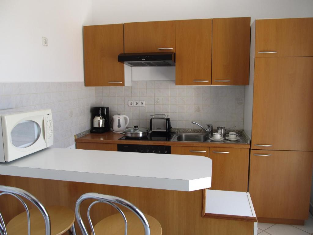 Kuchyň nebo kuchyňský kout v ubytování Apartment Stipo A5