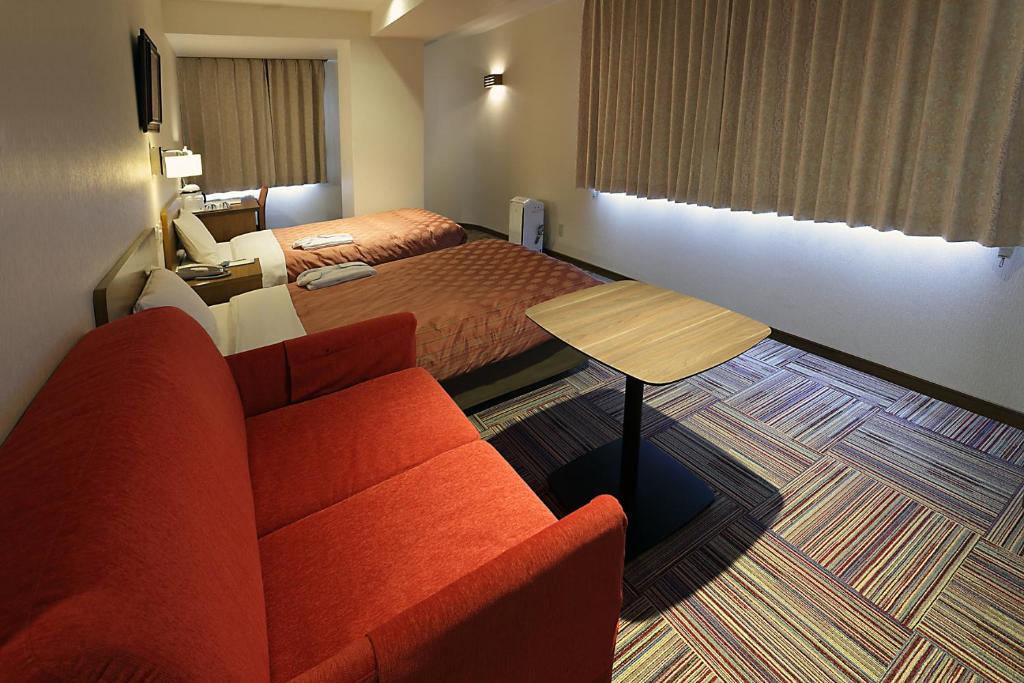 Posezení v ubytování Kumegawa Wing Hotel
