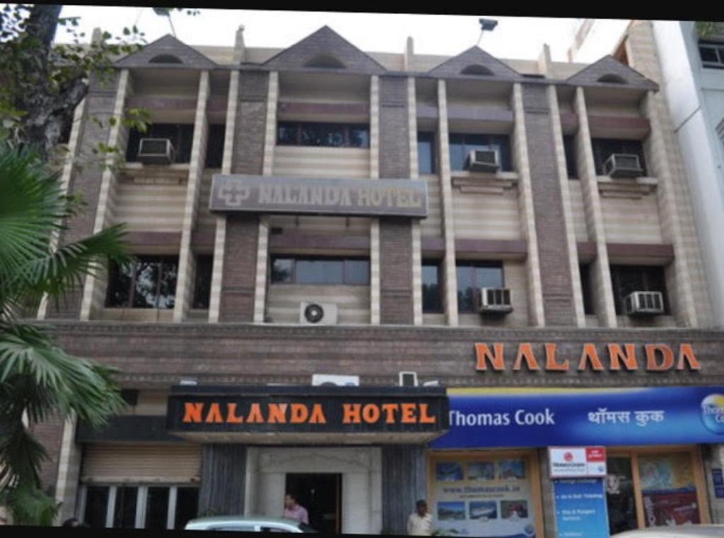 a building with a hotel in front of it at Nalanda Hotel in Jamshedpur
