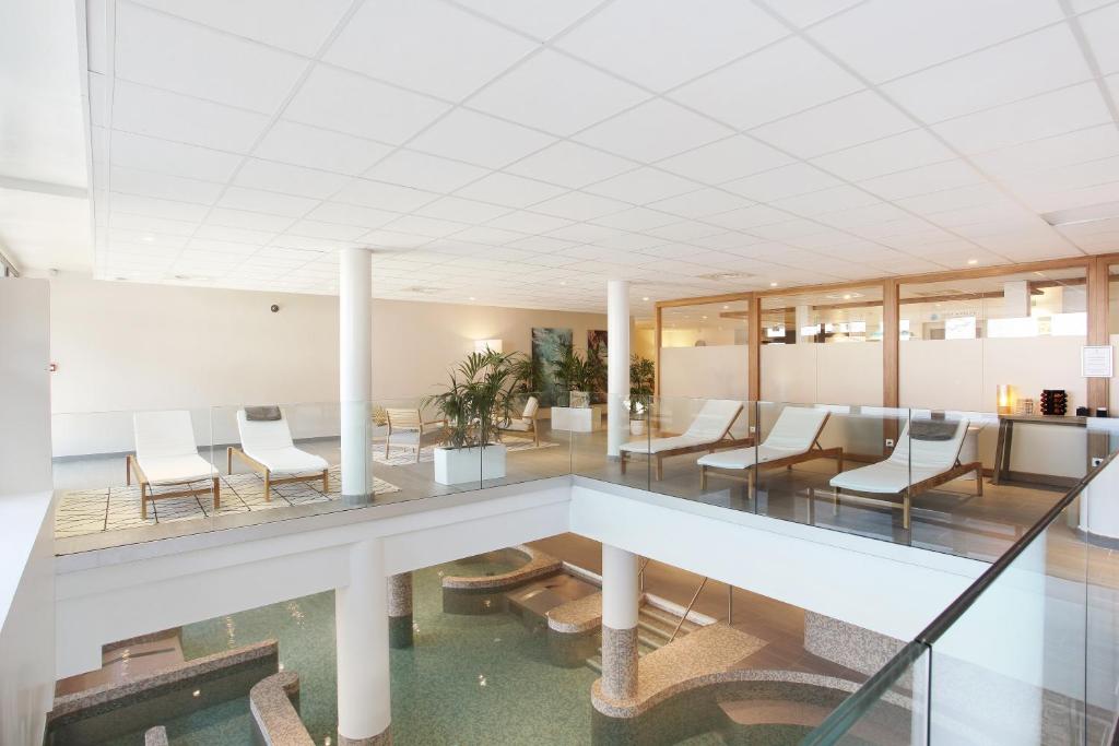 Posezení v ubytování Hôtel Prestige Odalys Le Chamois
