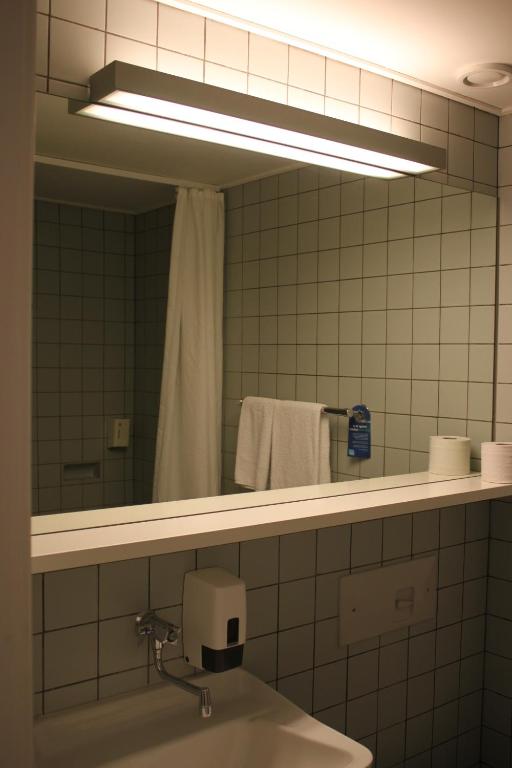 Koupelna v ubytování Skarrildhus Sinatur Hotel & Konference