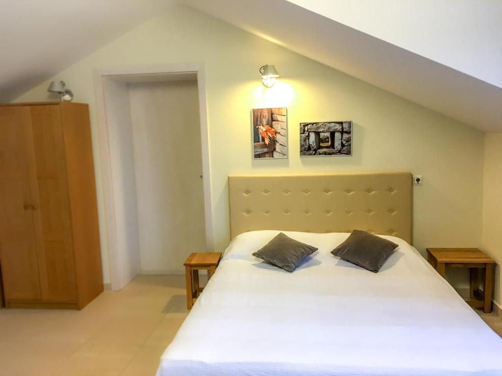 Posteľ alebo postele v izbe v ubytovaní Eol Apartments Viganj