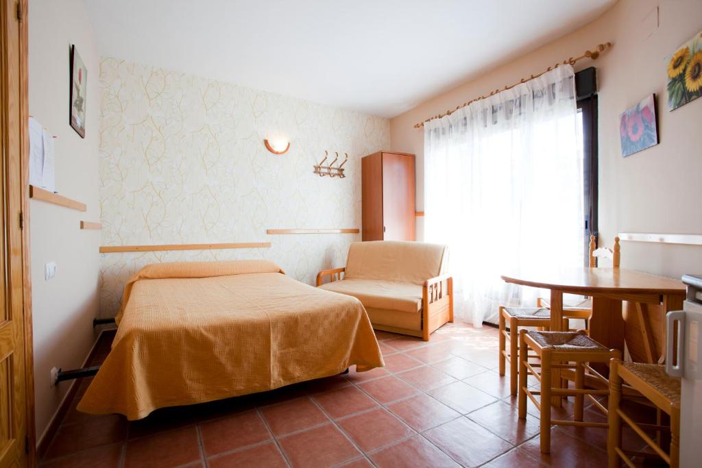 Postel nebo postele na pokoji v ubytování Apartamentos Rurales "La Fuentecilla"