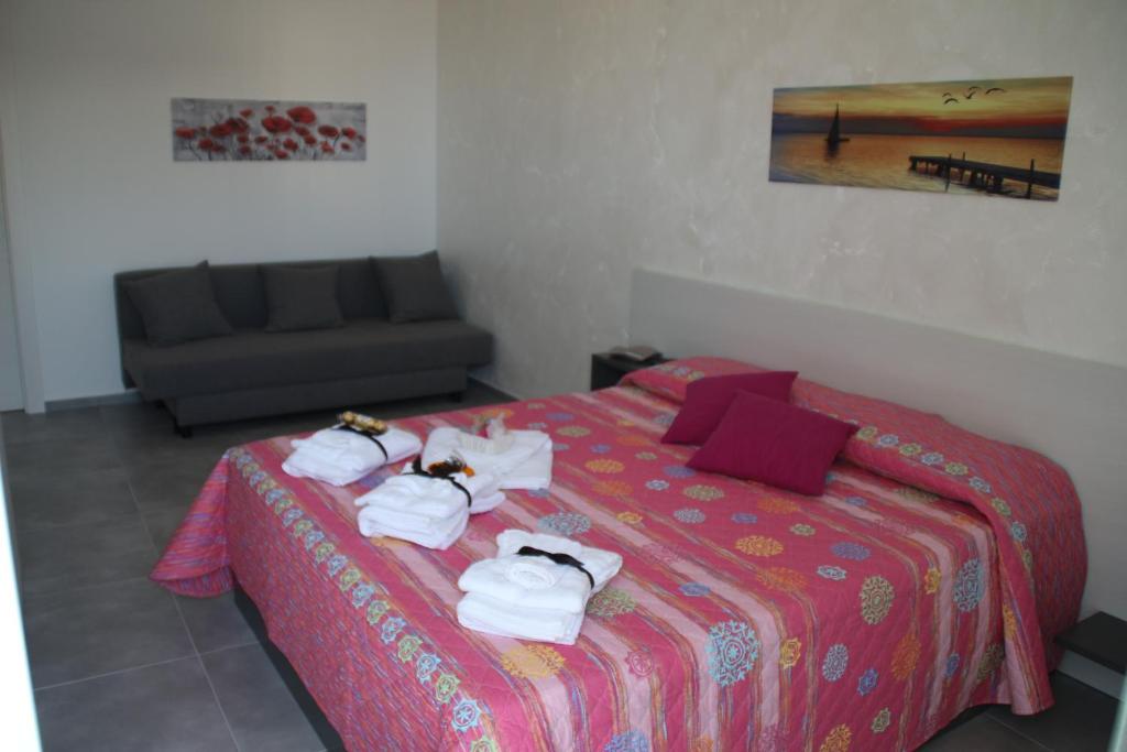 Postel nebo postele na pokoji v ubytování la Terrazza B&B