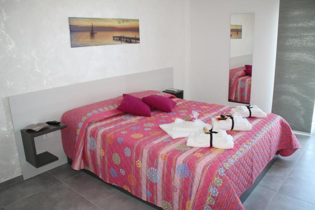 Postel nebo postele na pokoji v ubytování la Terrazza B&B