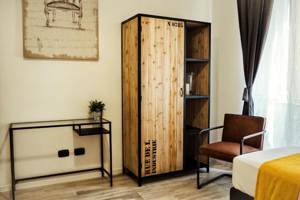 A seating area at BMGA l Stylish Industrial Termini Apartment