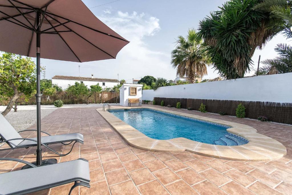 Bazén v ubytovaní Villa Finca Sol Javea alebo v jeho blízkosti