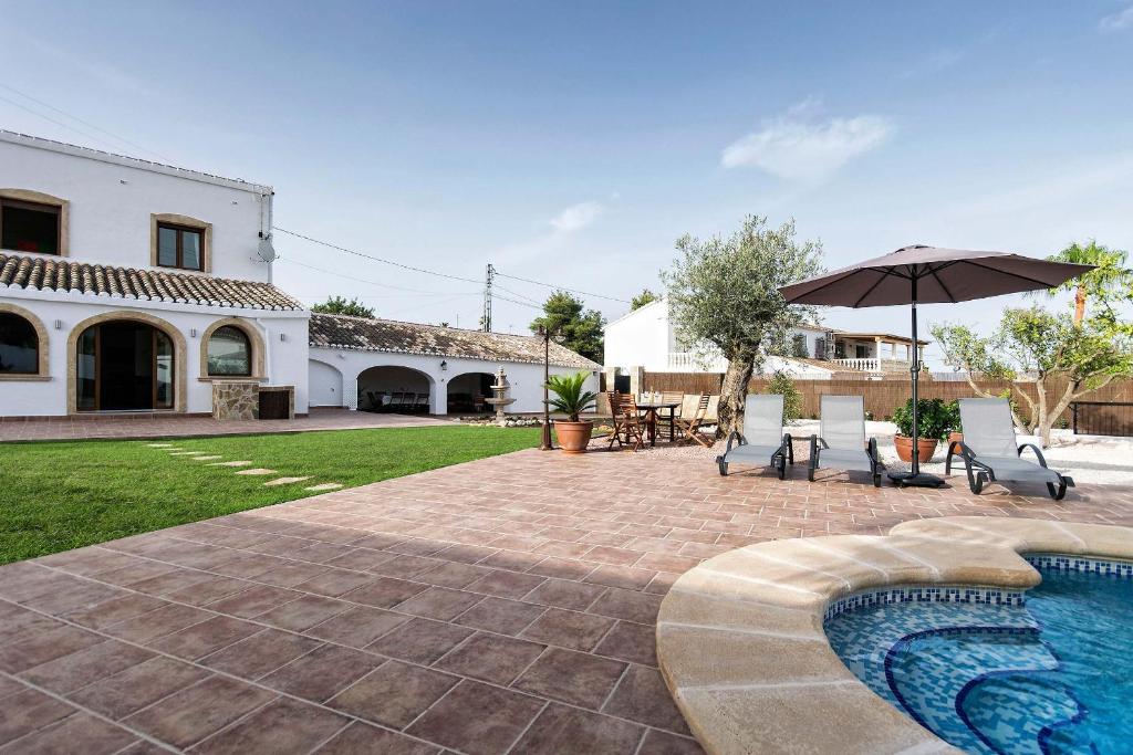 Bazén v ubytovaní Villa Finca Sol Javea alebo v jeho blízkosti