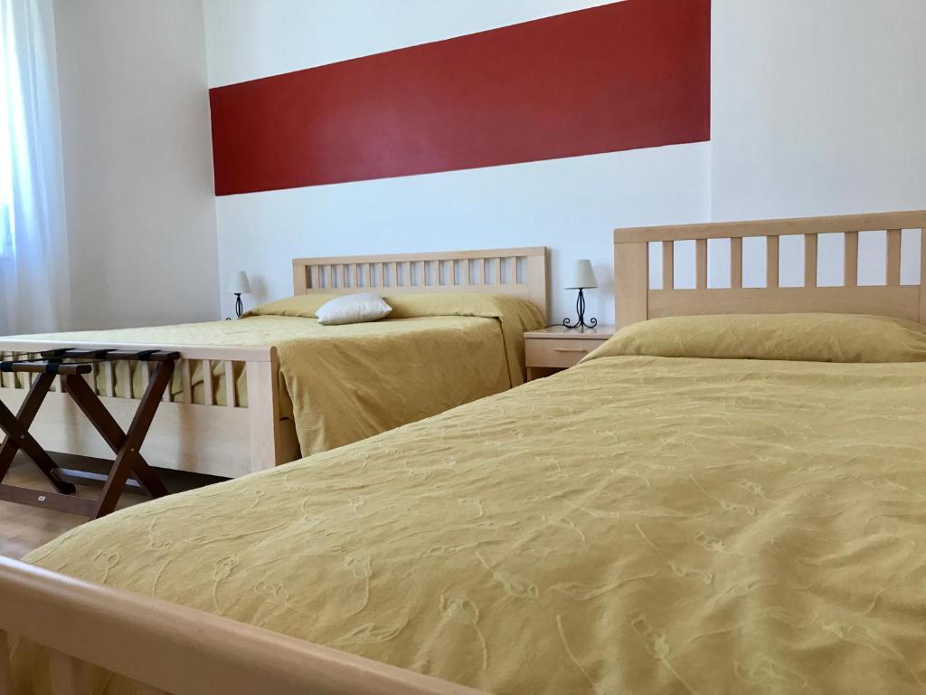 Postel nebo postele na pokoji v ubytování La Lanterna