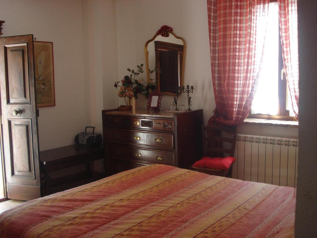 Postel nebo postele na pokoji v ubytování Casale La Fornace