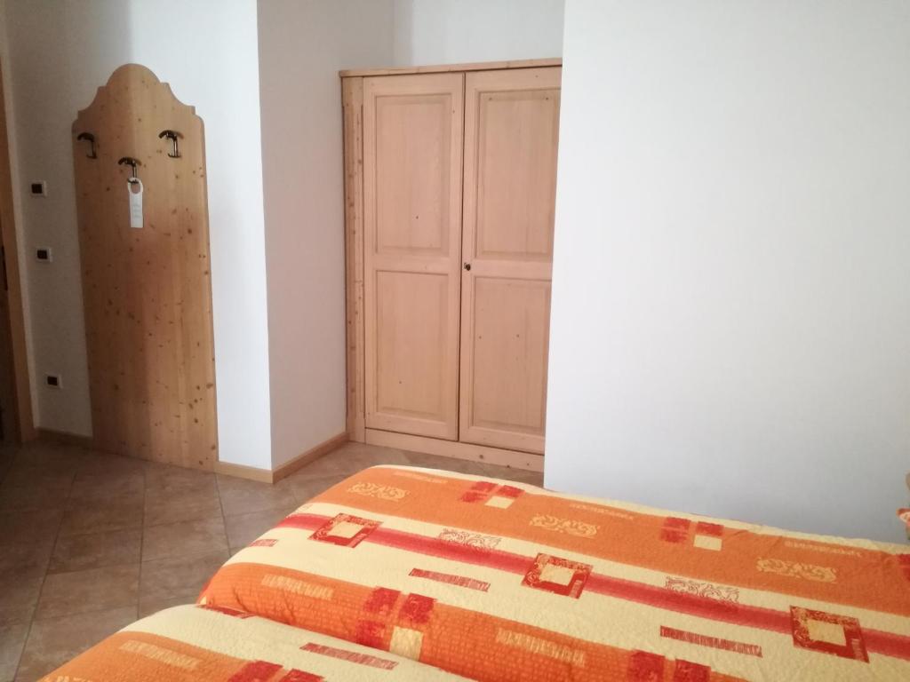 Postel nebo postele na pokoji v ubytování Agriturismo Le Cavade