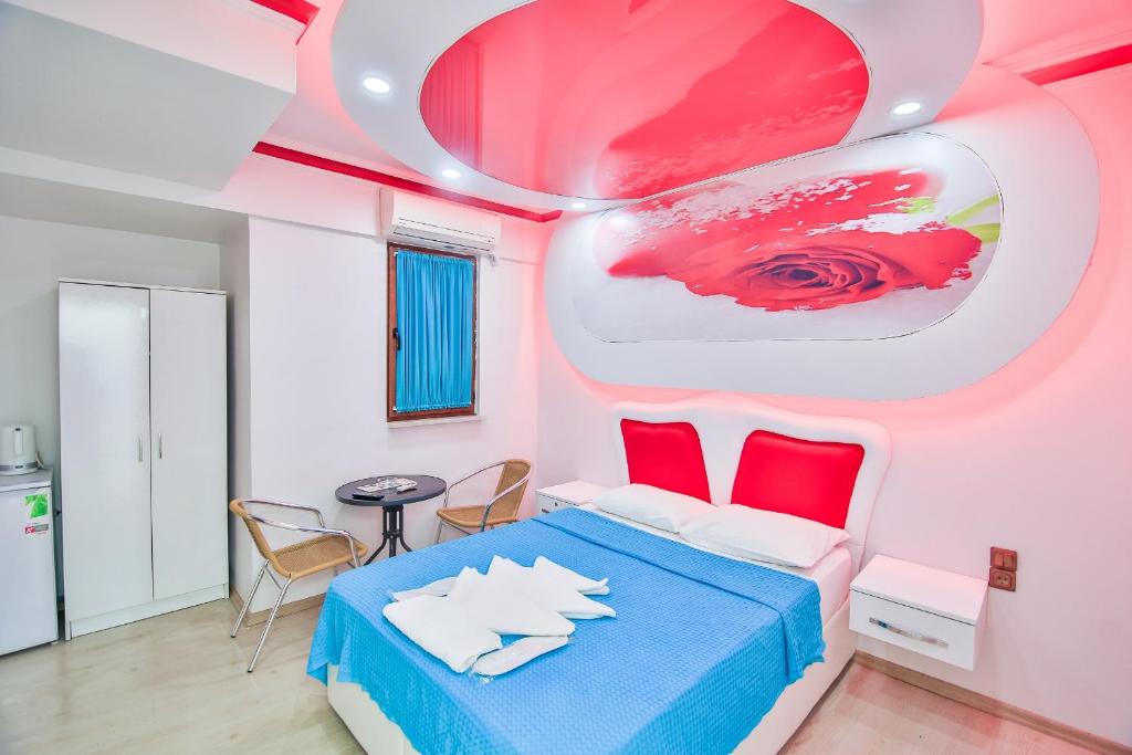 Postel nebo postele na pokoji v ubytování Ay Işığı Pansiyon