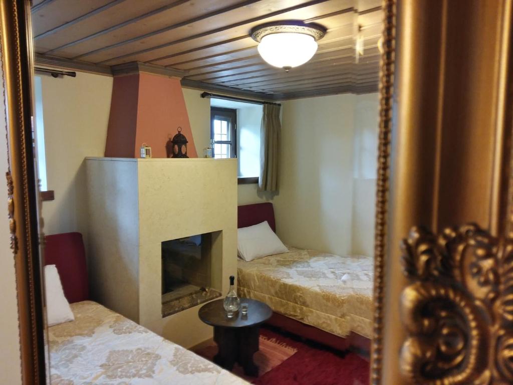 Postel nebo postele na pokoji v ubytování Archontiko Evridikis