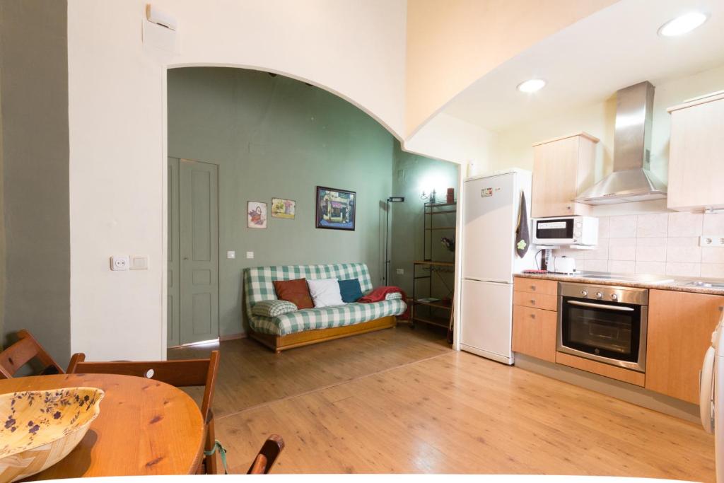 Kuchyň nebo kuchyňský kout v ubytování INNOUTHOME Apartamento Andreu Llambrich