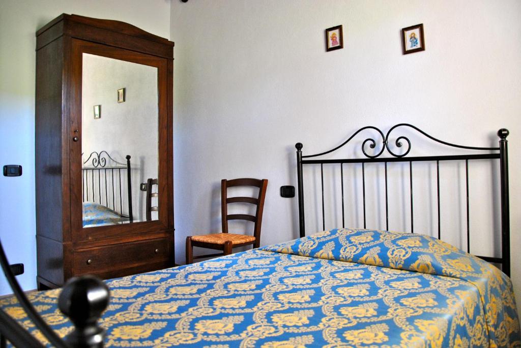 Posteľ alebo postele v izbe v ubytovaní Agriturismo Marinello