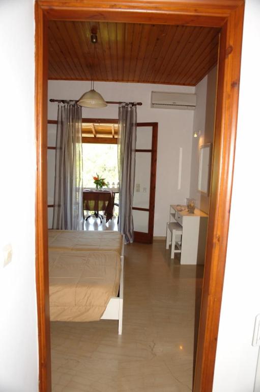 A bed or beds in a room at Villa Papoulas