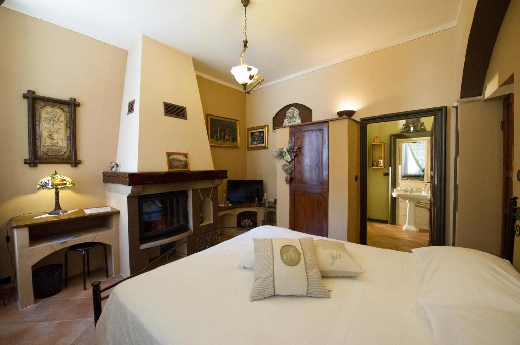 Postel nebo postele na pokoji v ubytování B&B Borgo Cortese