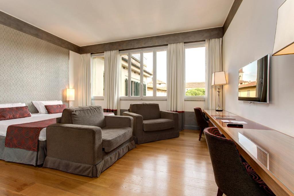 Postel nebo postele na pokoji v ubytování Hotel Orto de' Medici