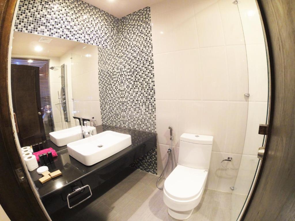 Koupelna v ubytování LVIS blancura Hotel