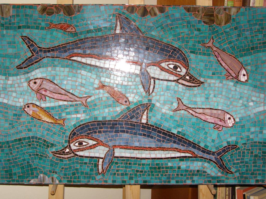 a mosaic of fish on a wall at Tatiana`s apartments in Stavros