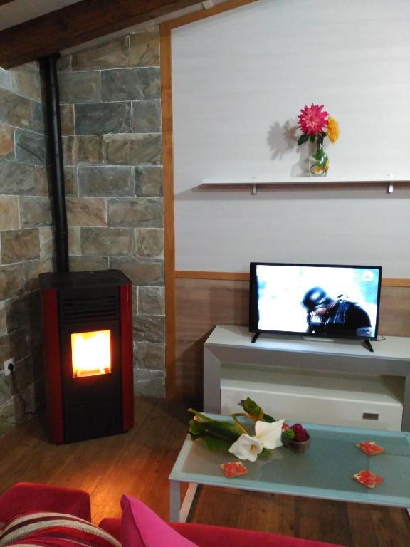 TV a/nebo společenská místnost v ubytování Bungalows Cantia