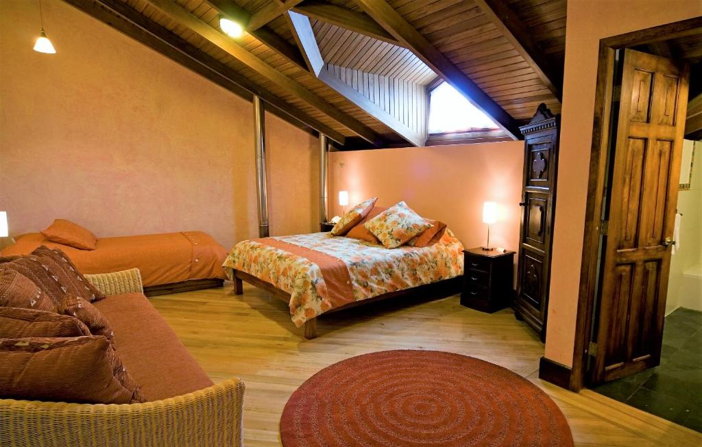 Postel nebo postele na pokoji v ubytování Boutique Hotel Casa Foch