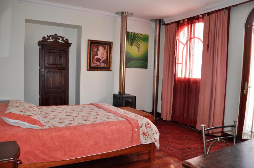 Postel nebo postele na pokoji v ubytování Boutique Hotel Casa Foch