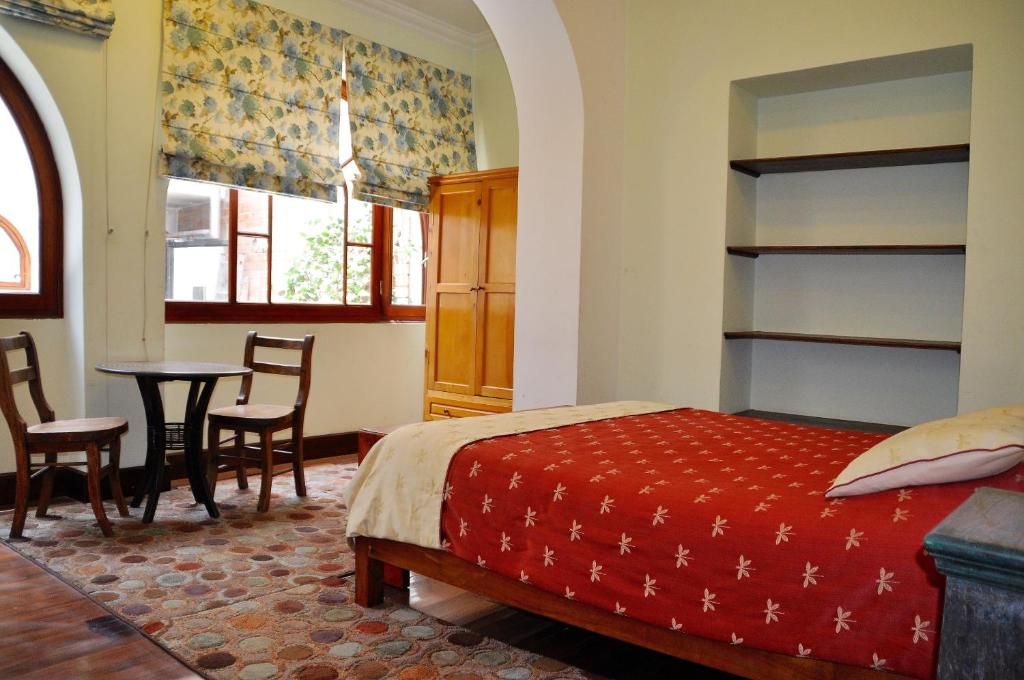 Postel nebo postele na pokoji v ubytování Boutique Hotel Casa Foch