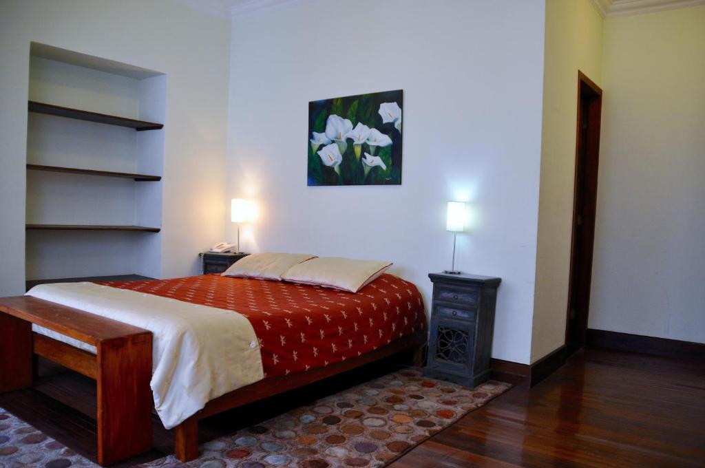 Postel nebo postele na pokoji v ubytování Boutique Hotel Casa Foch