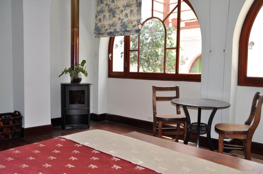 Postel nebo postele na pokoji v ubytování Boutique Hotel Casa Foch