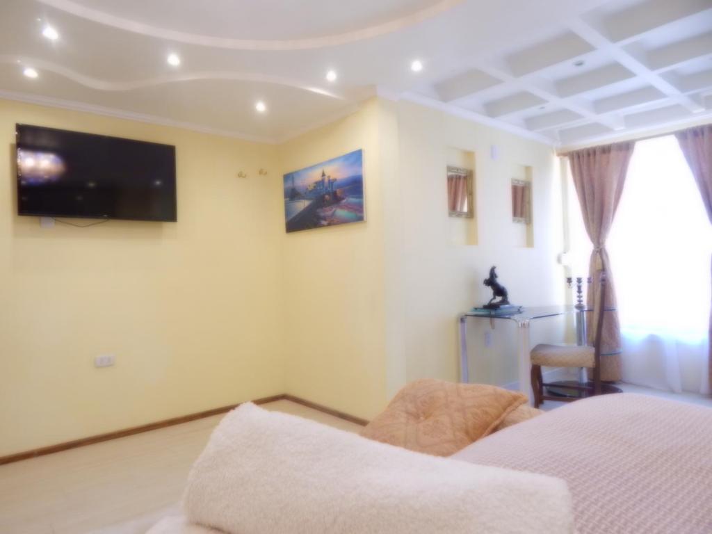 Postel nebo postele na pokoji v ubytování Hotel Boutique Castillo del Mar