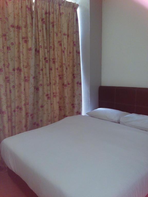 Postel nebo postele na pokoji v ubytování T-hotel JB