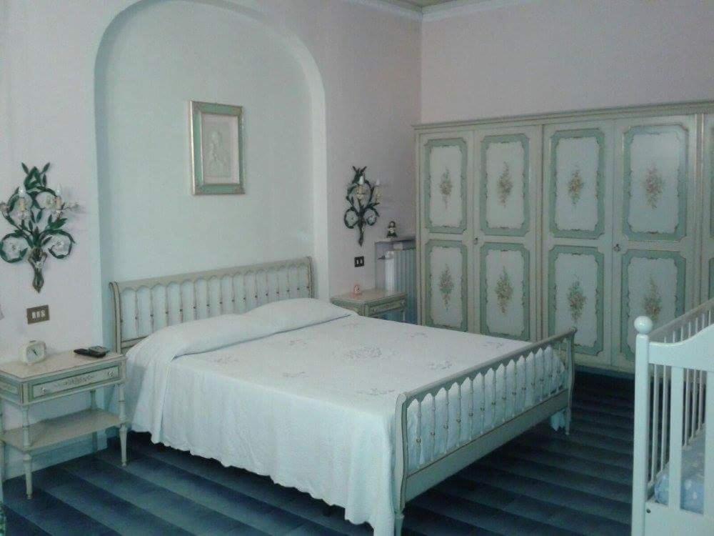 Postel nebo postele na pokoji v ubytování B&B Dai Nonni