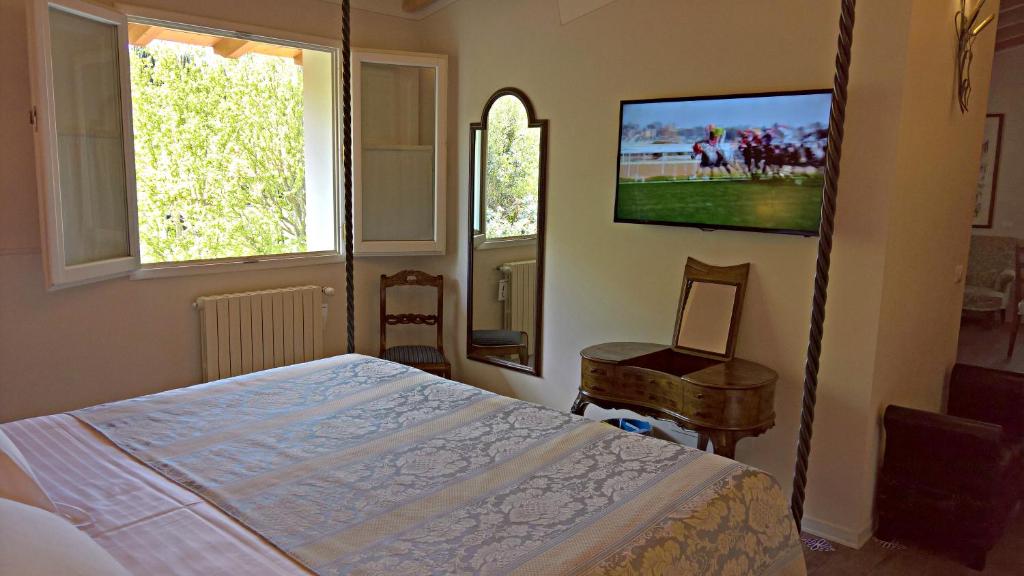 TV a/nebo společenská místnost v ubytování Hotel David