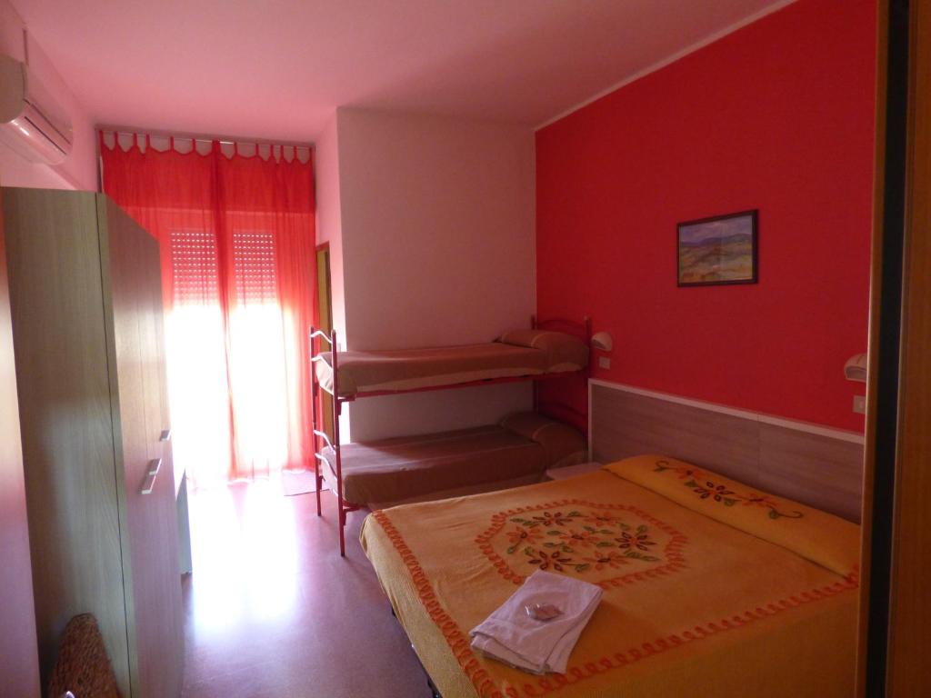 Postel nebo postele na pokoji v ubytování Consul Hotel