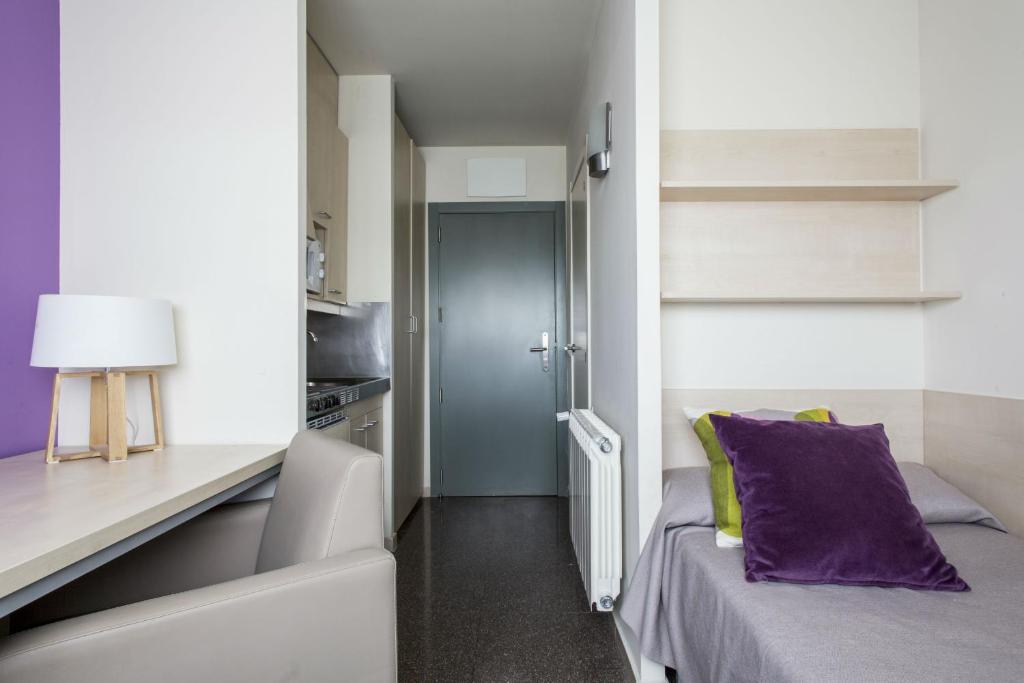 Postel nebo postele na pokoji v ubytování Residencia Universitaria Resa Los Abedules