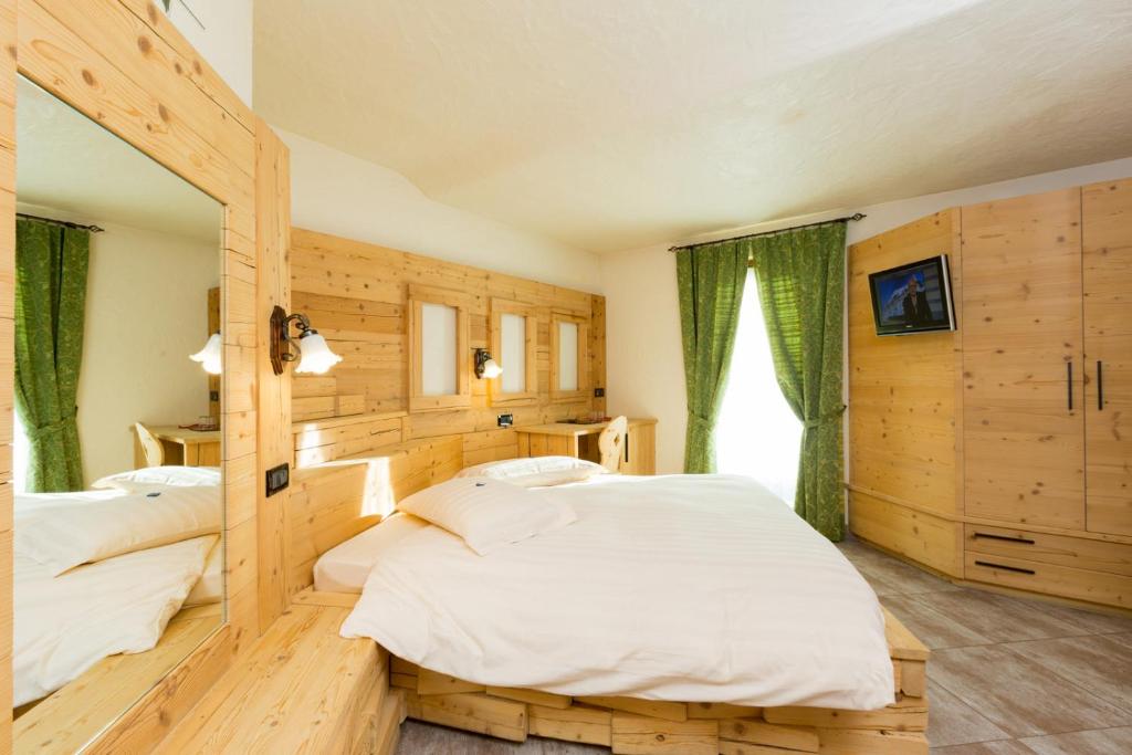 Posteľ alebo postele v izbe v ubytovaní Hotel Pontiglia
