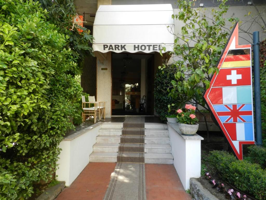 a front entrance to a park hotel with a sign at Park Hotel in Albisola Superiore