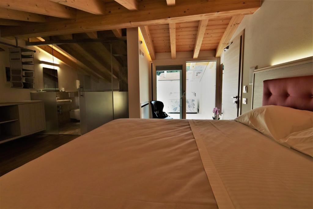 Postel nebo postele na pokoji v ubytování Residenza Ai Capitelli