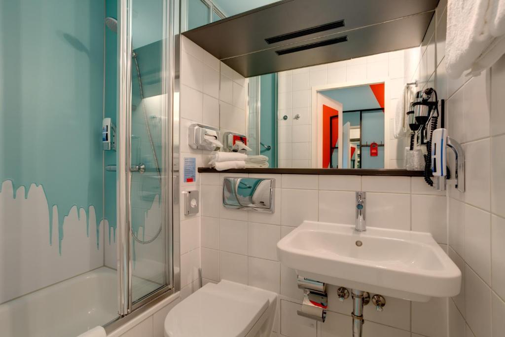 Koupelna v ubytování MEININGER Hotel Leipzig Hauptbahnhof