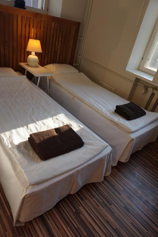 Voodi või voodid majutusasutuse Looming Hostel toas