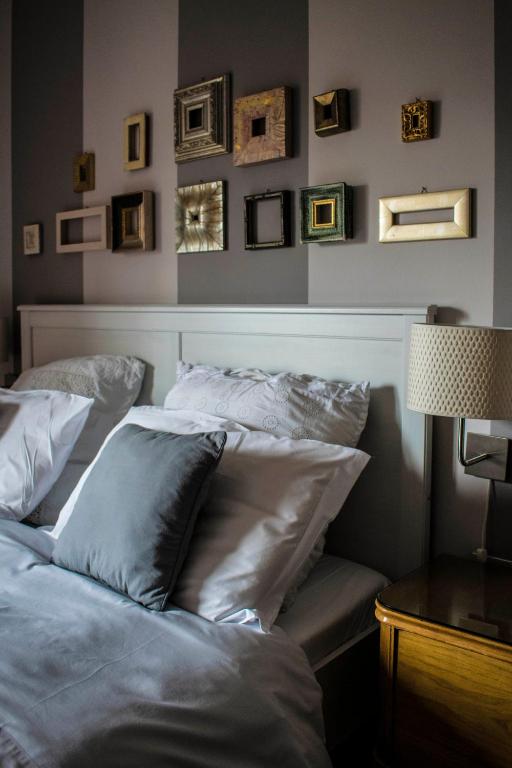 Łóżko lub łóżka w pokoju w obiekcie B&B La Cuntana