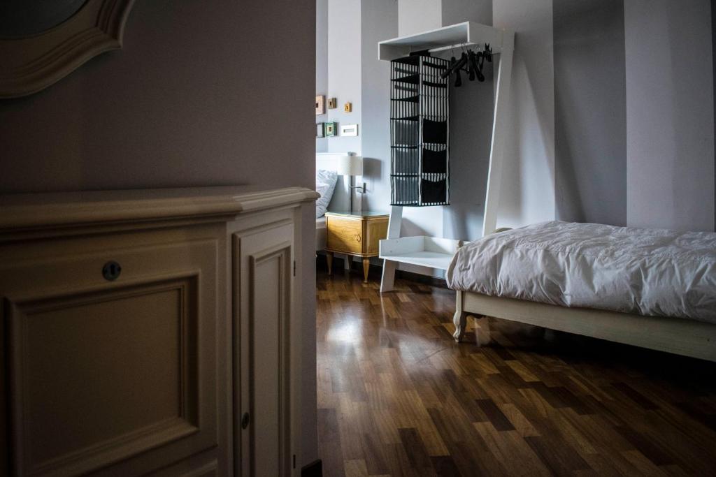 Łóżko lub łóżka w pokoju w obiekcie B&B La Cuntana