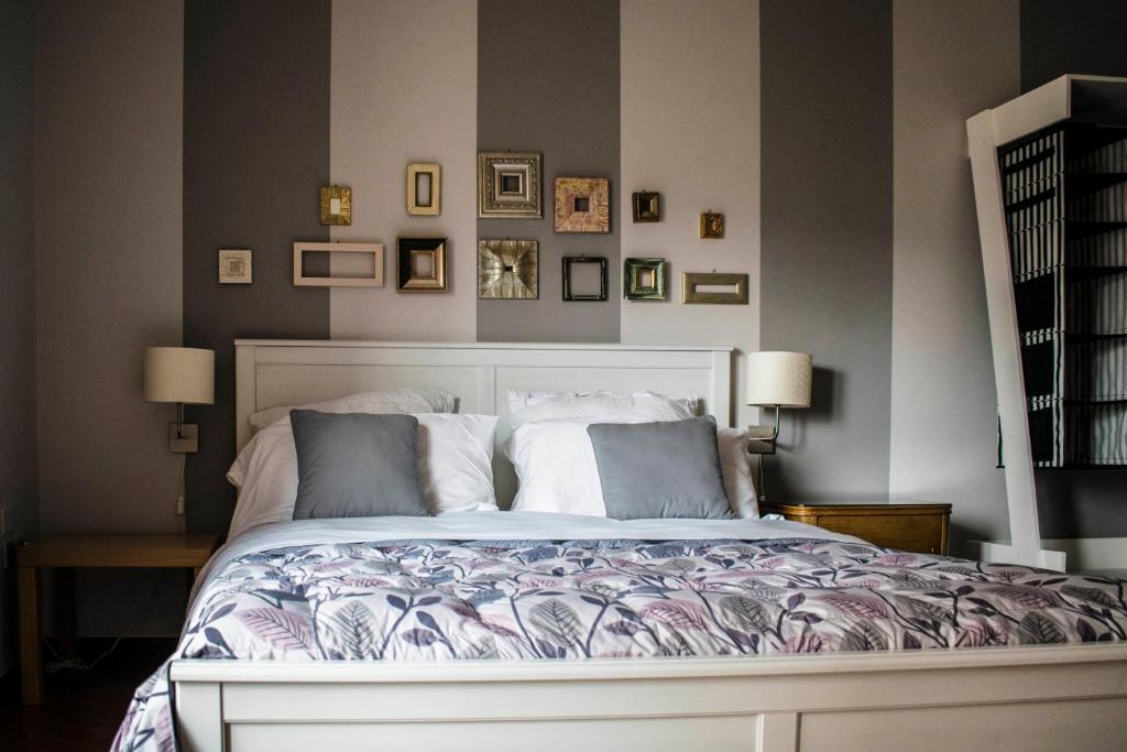 Łóżko lub łóżka w pokoju w obiekcie B&B La Cuntana