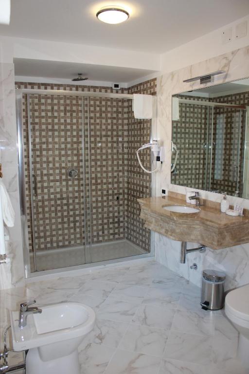 Koupelna v ubytování Hotel Casanova