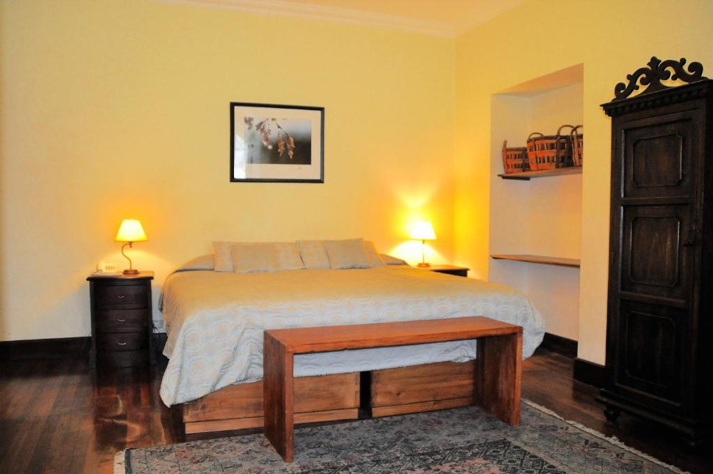 Postel nebo postele na pokoji v ubytování Boutique Hotel Casa Foch