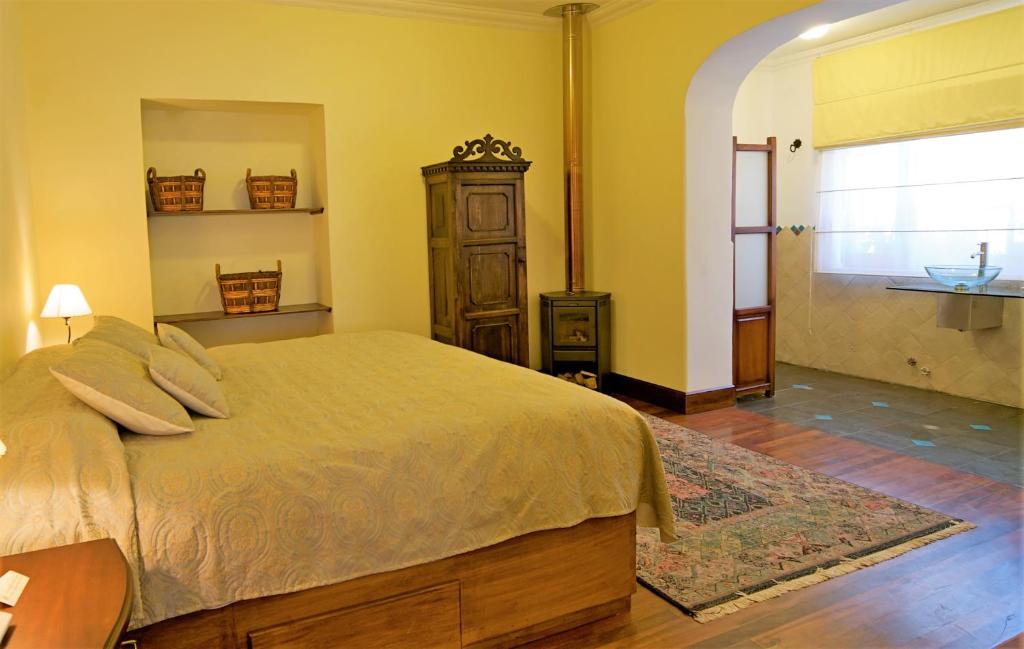 Postel nebo postele na pokoji v ubytování Boutique Hotel Casa Foch
