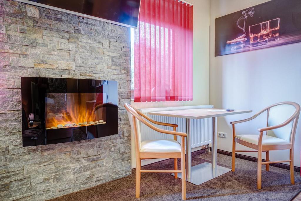Fotografie z fotogalerie ubytování Cafe Hoyer Pension und Appartements v destinaci Rödigsdorf