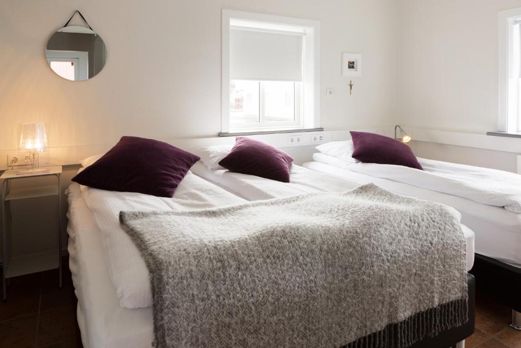 Postel nebo postele na pokoji v ubytování Casablanca Apartments
